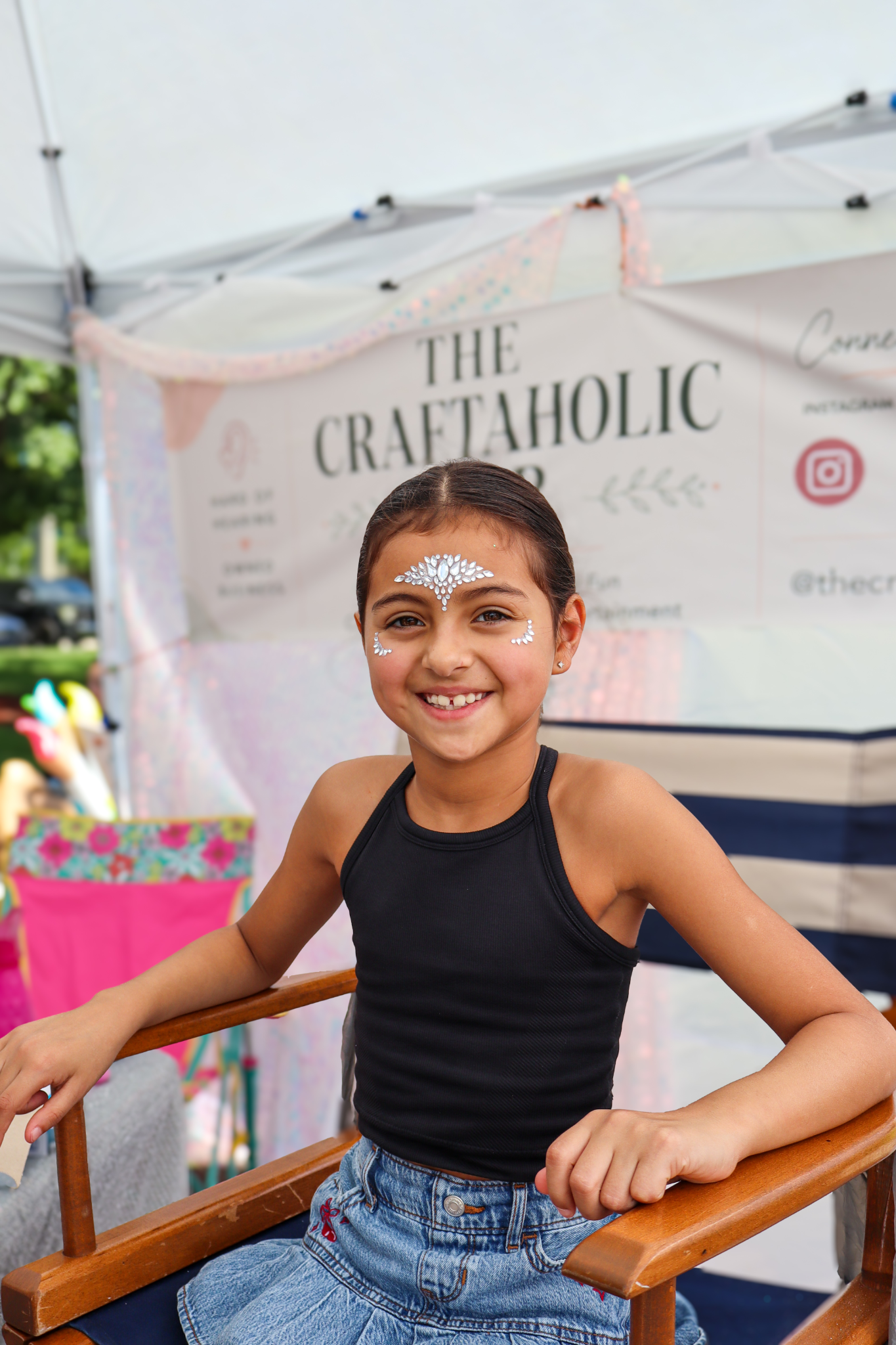 Young guest at an outdoor craft event